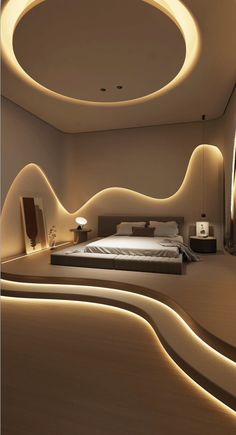 a bed room with a neatly made bed and some lights on the wall above it