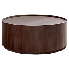 a round wooden table with a white top and brown wood grained finish on the surface