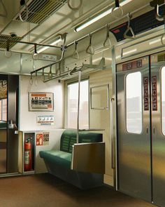 the inside of a subway car with lots of windows and green seats in front of them