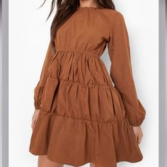 Nwt14brown Sugar Babe Smocked Dress Such A Chic & Classy Dress Figure Flattering Cut! Flowy & Boho Chic Vibes! Minimalist Touch! Handpicked With Love Nwt #Posh4chemo @2chicboutique Twice Chic Boutique Posh Ambassadors Since 2017 Bundle 2+ Save The Most #Curvystyles #Curvyfashion #Ownyourbeauty #2chic4chemo #Twicechicboutique Brown Ruched Long Sleeve Mini Dress, Fitted Tiered Brown Dress, Fitted Brown Tiered Dress, Spring Fitted Brown Smocked Dress, Brown Ruched Knee-length Mini Dress, Fitted Brown Smocked Dress For Spring, Casual Brown Smocked Back Dress, Knee-length Ruched Brown Mini Dress, Casual Brown Smocked Dress