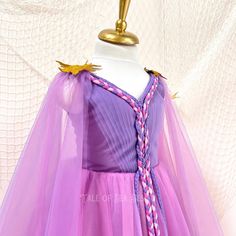 This Princess Rapunzel Dress is created for Rapunzel Birthday themed parties, pageants, Halloween and other special events.
Rapunzel costume is handmade using top quality satin and dream tulle. The princess costume has soft lining inside the bodice.
You can adjust the tightness of the tutu princess dress with the laces at the corset style back.
The front of the Rapunzel dress is decorated with braids reminescent of Rapunzel's hair.
The processing time for this fairytale dress is 5 business days and it is shipped with express delivery
Available sizes are from 1t to 10 US Numeric. Tulle Ball Gown For Costume Party, Princess Style Tulle Gown For Fancy Dress, Purple Fantasy Dress For Costume Party, Purple Fantasy Costume Party Dress, Fantasy Style Purple Dress For Costume Party, Formal Princess Tulle Gown, Princess Costume Dresses For Cosplay Events, Princess Style Fairy Dress For Fancy Dress, Fitted Princess Fairy Dress For Fancy Dress