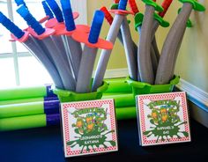 there are many toothbrushes in the cup on the table next to each other