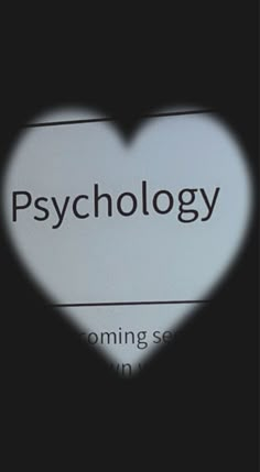 the shadow of a heart on a sign that says psychology