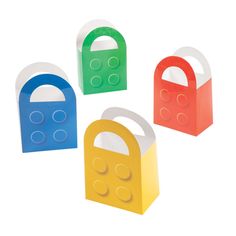 four lego blocks shaped like bags with handles