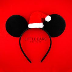 a mickey mouse ear hat with the words little ears on it