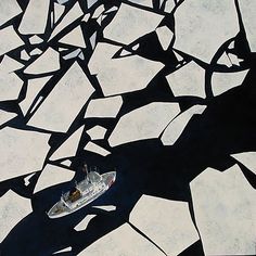 an aerial view of a boat in the water surrounded by ice floes and snow