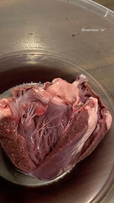 the meat in the pan is being cooked and ready to be put into the oven