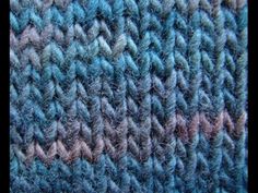 a close up view of some blue and brown carpet