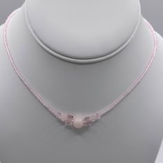 16 Inch Light Pink Glass Seed Beads. Light Pink Crystals With Rose Quartz Round Beads. Stretch Cord Used. Slip Over Your Head. Handmade Piece. Never Worn. Rose Quartz Choker, Beaded Rose Quartz Necklaces With Faceted Round Beads, Rose Quartz Beaded Necklaces With Faceted Beads, Beaded Rose Quartz Crystal Necklace, Handmade Pink Pearl Necklace, Beaded Rose Quartz Round Bead Jewelry, Light Pink Necklace, Light Pink Jewelry, Quartz Choker