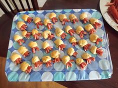 there are many little crab cakes on the tray