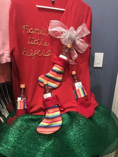 a woman's red shirt with colorful socks on it