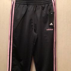 Black And Pink Strips Girls Size L(14) Pink Sportswear Sweatpants For Jogging, Pink Sweatpants For Jogging, Pink Sportswear Sweatpants For Sports, Pink Jogging Pants For Spring, Spring Pink Jogging Pants, Pink Adidas Activewear For Spring, Casual Pink Adidas Activewear, Sporty Pink Joggers For Jogging, Pink Adidas Sports Bottoms