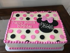 a birthday cake with minnie mouse on it