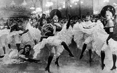 an old black and white photo of dancers