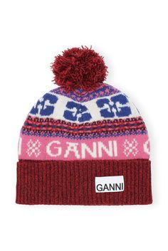 This Graphic Wool Beanie is made from recycled wool, wool and recycled polyamide. The beanie features a ribbed edge, graphic pattern and a pompom detail. GANNI Graphic Wool Beanie | Women's Crochet Beret, Wool Beanie, Mohair Sweater, Graphic Patterns, Knitting Designs, Knit Beanie, Pink Fashion, Beanie Hats, Small Gifts