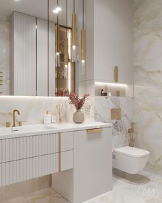 a white bathroom with gold accents and marble walls