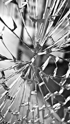 a broken glass window that has been shattered