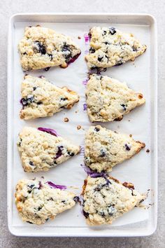 blueberry scones on a baking sheet ready to be baked