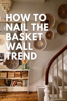 a staircase with baskets on the wall next to it and text overlay that reads how to nail the basket wall trend