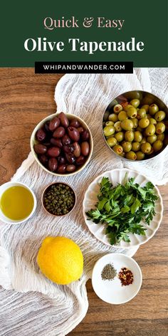 olives and other ingredients are arranged in bowls on a towel