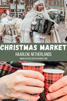 a person holding a coffee cup and an accordion in their hands with the words christmas market harlem, netherlands