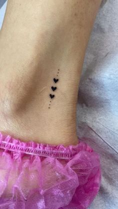 small black hearts tattoo on the ankle