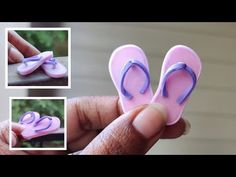 a hand holding a pink and purple pair of flip flops