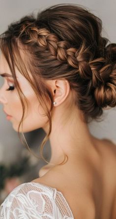 Discover 30 stunning braided bun hairstyles that are perfect for any season. These buns add a touch of elegance and sophistication to any look, making them ideal for both work and play. From classic to contemporary styles, find the braided bun hairstyle that suits your personality and enhances your natural beauty. Wedding Updo Front View Low Buns, Boho Bridal Bun, Wedding Messy Bun Hairstyles, Bridal Hair Updo Plait, Low Bun Wedding Hair With Braid, Braid With Bun Hairstyles, Hair Bun With Braid, Low Bun With Braid Wedding Hair