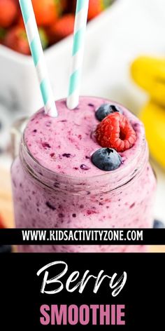 berry smoothie in a mason jar with strawberries and blueberries