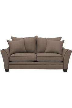 an image of a couch with pillows on it's back and the seat upholstered