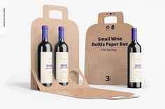 two bottles of wine sitting next to each other in front of a cardboard packaging box