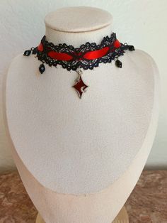 Hand crafted choker perfect for goth / alt / egirl / vampire / vintage styles. Great for events like the Renaissance fair. This choker is made with black lace, red satin ribbon, and a red charm. Ordee now for the perfect accessory for Halloween! Vampire Vtuber, Vampire Drawing, Alt Egirl, Vampire Vintage, White Lace Choker, Red Goth, Diy Choker, Vampire Clothes, Red Choker