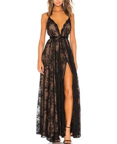 PRICES MAY VARY. Fabric: 95% Polyester+5% Spandex. This maxi dress showcases a beautiful black lace overlay, delivering a romantic and delicate allure. Benefit: Women black evening gown, elegant chic style, the high split design highlights your perfect body curve and makes you look sexier, while allowing for unrestrained movement as you glide through your event. Features: Spaghetti straps maxi dress, onvertible shouldernstraps with back tie closure. The cross-back strap design adds an unexpected Paris Gown, Black Evening Gown, Michael Costello, Spaghetti Strap Maxi Dress, Split Maxi Dress, Revolve Clothing, Guest Dresses, Fitted Dress, Floral Lace