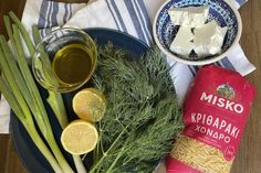 some vegetables and cheese are sitting on a plate next to a bag of misko