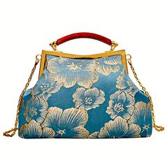 Brand New, Never Worn Silky, Stunning Blue With Shimmering Gold Floral Pattern, This Beautiful And Versatile Bag Can Be Dressed Up Or Down; Quiet Luxury Golden Hardware Complements The Colors Of The Bag Size: 7" X 12" X 3" Approximately All Offers Welcome! If You Have Any Questions Please Leave Them In The Comment Field And Thank You For Stopping By My Closet! Light Blue Rectangular Shoulder Bag As Gift, Blue Satchel Box Bag For Mobile Phone, Blue Satchel Shoulder Bag For Party, Blue Satchel Box Bag For Formal Occasions, Handheld Blue Satchel With Mobile Phone Bag, Elegant Portable Clutch Satchel, Formal Blue Satchel Box Bag, Blue Satchel Bags, Blue Crossbody Evening Bag As Gift