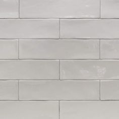 a white brick wall with no mortars on it