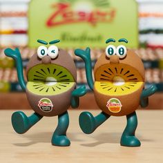 two toy figurines that look like they are dancing