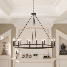 a chandelier hanging from the ceiling in a room with white walls and fireplace