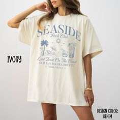 a woman wearing a white seaside t - shirt with the words design color denim on it