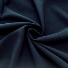 a close up shot of a dark blue fabric