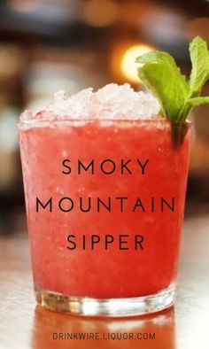 a drink in a glass with the words smoky mountain siper written on it's side