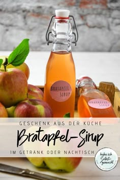 an apple cider and some apples on a table with the words, braappel - strip