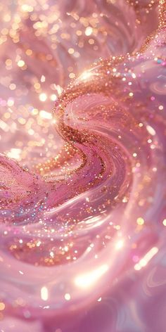 an abstract pink and gold background with sparkles in the air, like waves or swirls