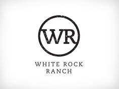 the logo for white rock ranch, which is located in an area that looks like it has