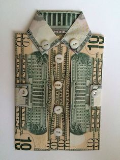 an origami shirt made out of dollar bills and buttoned up with buttons