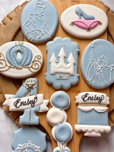 decorated cookies are arranged in the shape of baby's arrivals and their names