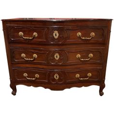 an antique chest of drawers with brass handles and knobs on the top, isolated against a white background