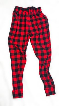 Buffalo plaid print joggers-red and black -Solid trim -Drawstring waistband -Waist pockets -Cuffed hems 92% Polyester/ 8% Spandex S/M/L/XL Measurements (Approximate) Size Waist Hips Inseam Small 26" 38" 28" Medium 28" 40" 28" Large 30" 42" 28" X Large 32" 44" 28" td {border: 1px solid #ccc;}br {mso-data-placement:same-cell;} Cozy Clothes, Matching Pjs, Printed Joggers, Red Tartan, Cozy Outfit, Plaid Pants, Plaid Print, Black Solid, Drawstring Waistband