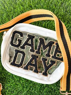 CLEAR STADIUM BAG - STADIUM APPROVED! For the sports loving girlie, our GAME DAY chenille patch clear stadium bag comes in multiple colors and you get to choose your strap! BAG COLORS:  * BLACK * WHITE CHENILLE PATCH COLORS: * Black Letters * White Letters STRAP OPTIONS: * White Sequin and Beaded Footballs * Fully beaded "Pittsburgh"  * Fully beaded "Game Day" * Black & White Stripe * Black & Yellow Stripe * Black & Gold Glitter Stripe * Black & Gold Metallic Stripe * Black & White Leopard  * Checkered Black & White * Black/Yellow/White Stripe * Plain Black * Plain White * Plain Yellow Sporty Rectangular Game Day Bag, White Sporty College Bags, Game Day Bag, Football Bag, Plain Yellow, Clear Stadium Bag, Purse Game, Stadium Bag, Bags Game