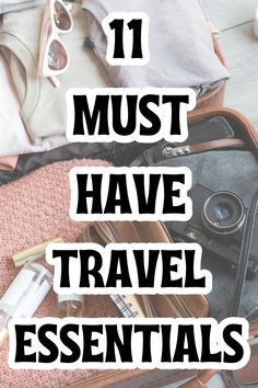 an open suitcase with the words 11 must have travel essentials on top of it